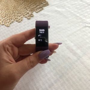 Firtbit charge 2 with the band and charging cord!